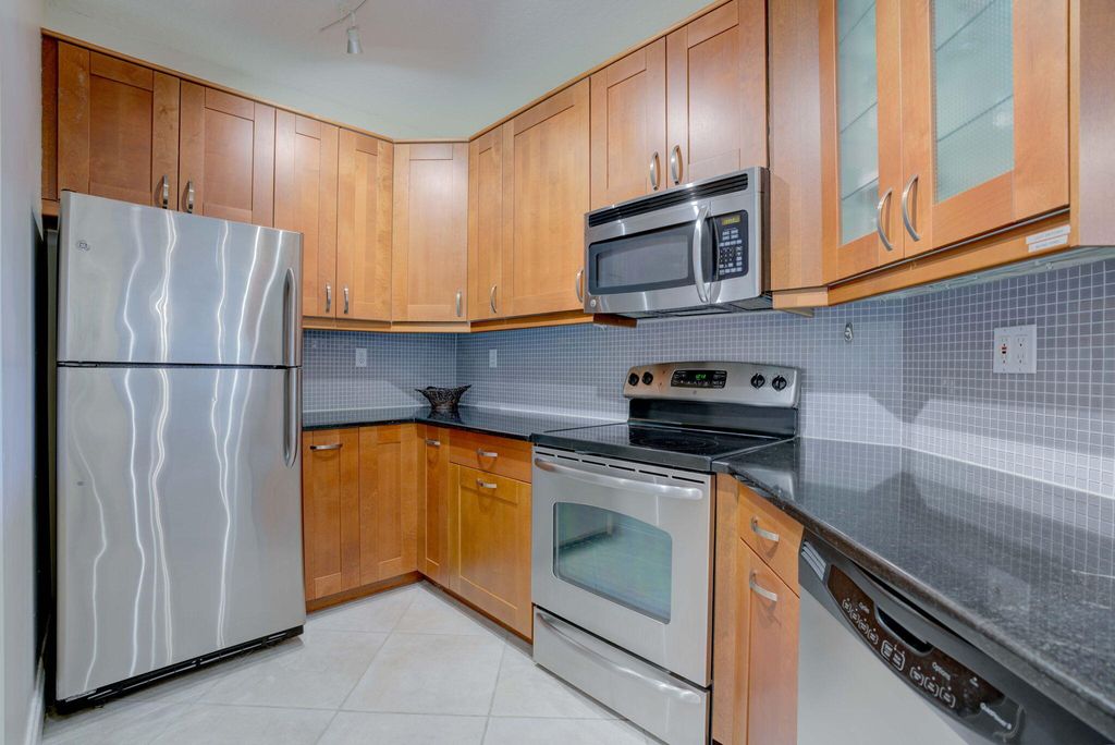 Photo of 500 Uno Lago Drive #404, Juno Beach, FL 33408 (MLS # R11169187)