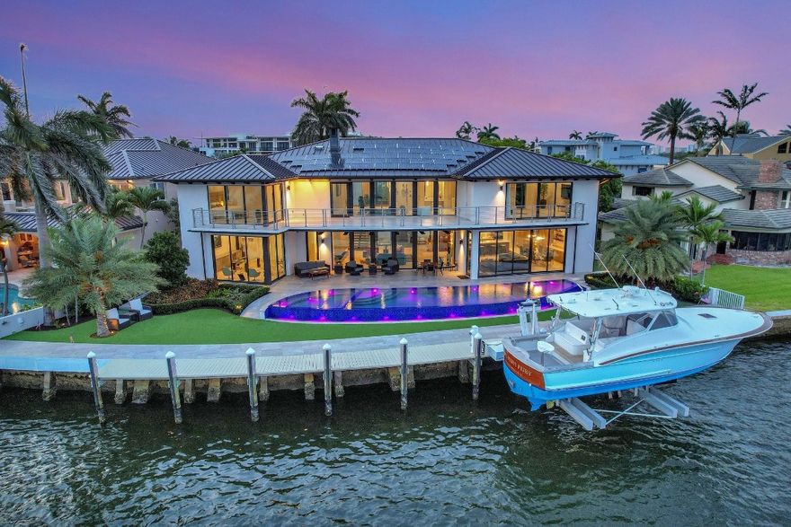 Wide open intracoastal to bay views comparable to a point residence overlooking Birch State Park! Stunning custom deepwater home located on desirable, quiet & private Isle with security patrol. Furniture negotiable. Coastal contemporary architecture, smart technology, full solar power, superior floorplan total 8,350sf +/-. "Wow" factor views immediately on entry! Dramatic open-concept great room, iron beams & fireplace. Ultimate Chef's kitchen, oversized island & extensive dining/entertaining areas, all access covered terrace. Impressive corner office overlooks waterways & resort-style custom pool, VIP guest suite. 2nd level: secondary primary suite, 2 bedroom suites (1 currently gym). Ultra-luxurious primary suite, separate spa baths/closets,  large flexible bonus room. Expansive balcony.