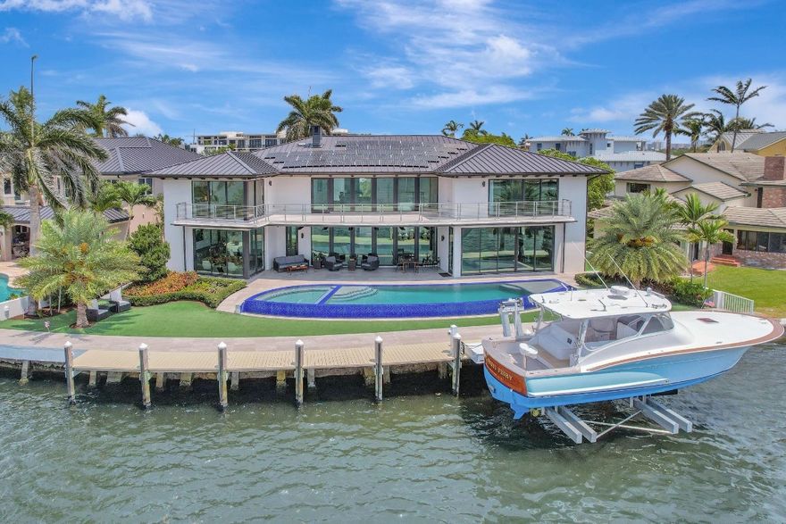 Wide open intracoastal to bay views comparable to a point residence overlooking Birch State Park! Stunning custom deepwater home located on desirable, quiet & private Isle with security patrol. Furniture negotiable. Coastal contemporary architecture, smart technology, full solar power, superior floorplan total 8,350sf +/-. "Wow" factor views immediately on entry! Dramatic open-concept great room, iron beams & fireplace. Ultimate Chef's kitchen, oversized island & extensive dining/entertaining areas, all access covered terrace. Impressive corner office overlooks waterways & resort-style custom pool, VIP guest suite. 2nd level: secondary primary suite, 2 bedroom suites (1 currently gym). Ultra-luxurious primary suite, separate spa baths/closets,  large flexible bonus room. Expansive balcony.