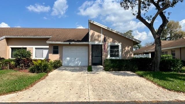 Perfect home to stay in while you enjoy all of Whisper Walk's many amenities! Play tennis/pickleball, go for a swim, talk a nice walk on the beautiful path, see a show, play billiards or enjoy a number of other fun activities in this gated 55+ community located close to shopping, highways and South Florida nightlife. FULLY FURNISHED 2 bedroom/2 bath home with laundry room in unit, garage and driveway parking, enclosed Florida room and eat-in kitchen.