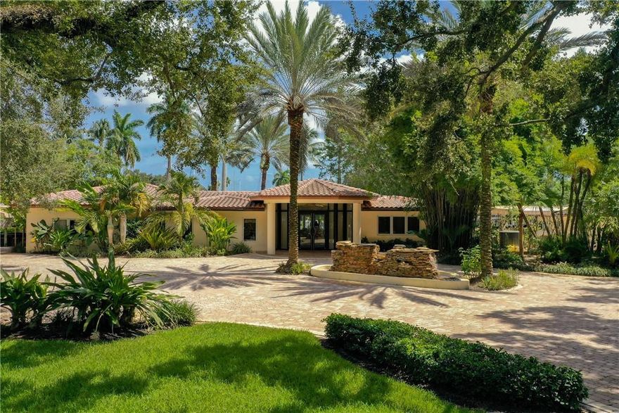 Stunning 1-story home on almost 1.5 acres of land! 360' boat dock w/ accommodation for mega yachts! Upon entering this gated Riverfront estate you are greeted w/ lush & tropical landscapes, creating a private & shaded approach. Open floor plan w/ high quality finishes, gourmet kitchen, wet bar & great room. Large master suite w/ sitting area & River views. Brand new whole property generator, new whole property water filtration system, & hurricane impact windows! 2 fully equipped guest houses on property, both w/ living rooms & kitchens. Also features separate 1 bedroom, 1 bath captain's quarters. Ultimate outdoor oasis with pool & tiki hut, perfect for entertaining. Enjoy the constant boat parade & breeze this beautiful property has to offer! Conveniently close to Downtown & beaches.