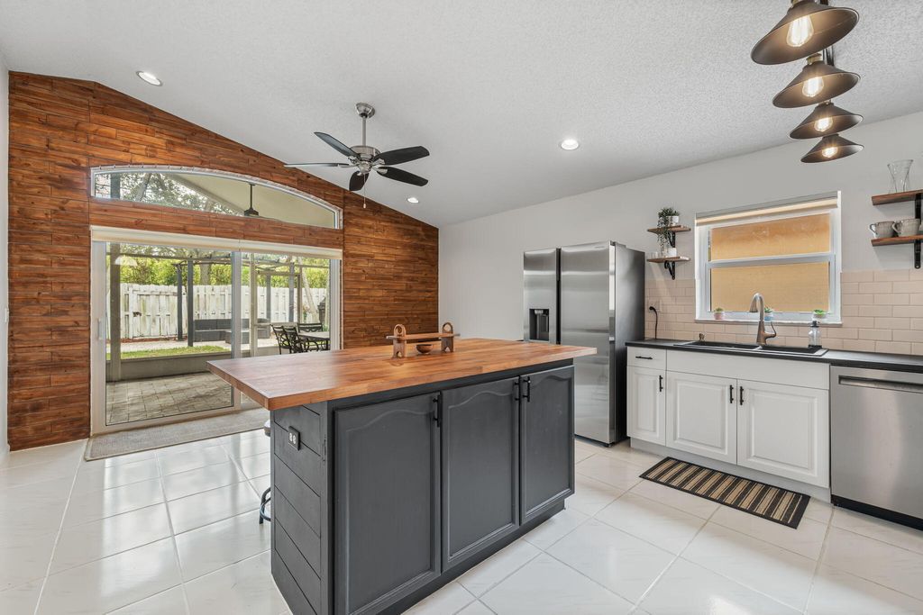 Photo of 5690 Green Island Drive, Lake Worth, FL 33463 (MLS # R11159601)