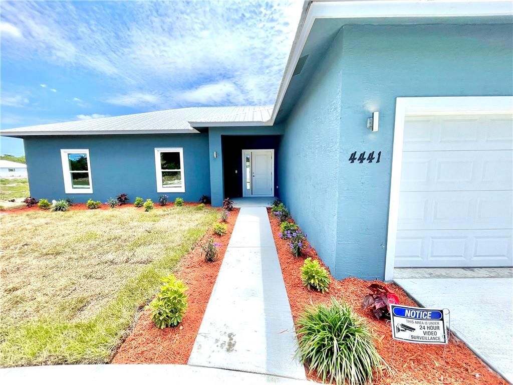 Photo of 4441 SW Port St Lucie Blvd, Port Saint Lucie, FL 34953 (MLS # F10331213)