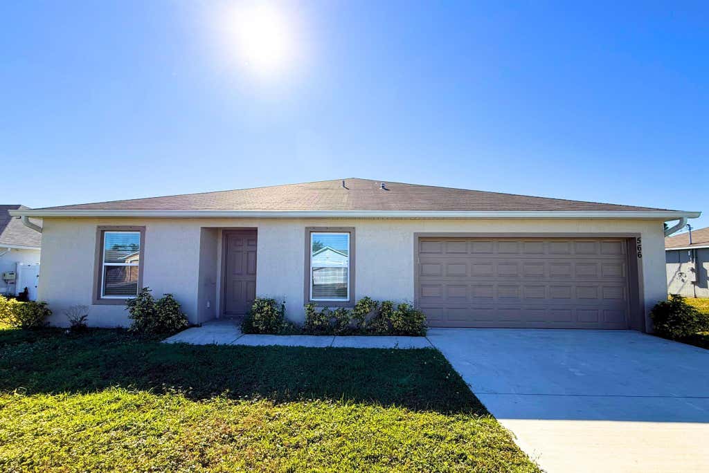 Photo of 566 SW Grove Avenue, Port Saint Lucie, FL 34983 (MLS # R11043130)