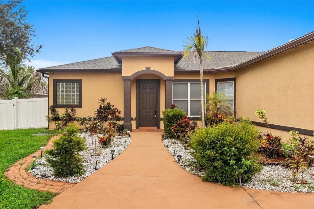 Photo of 2901 SW Pierson Road, Port Saint Lucie, FL 34953 (MLS # B26075624)