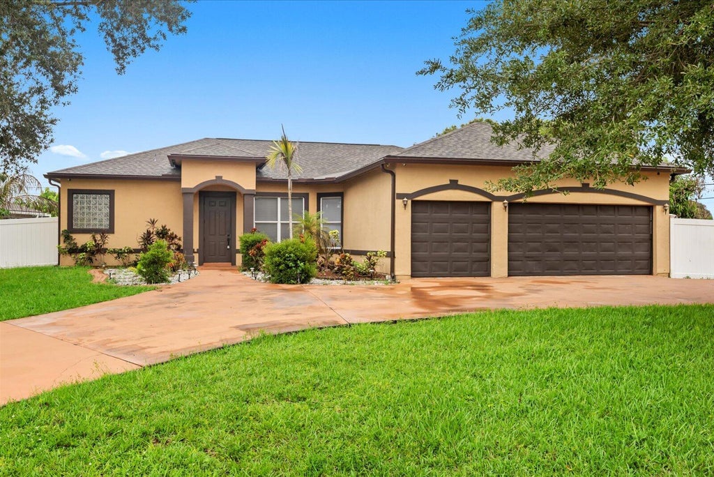 Photo of 2901 SW Pierson Road, Port Saint Lucie, FL 34953 (MLS # B26075624)
