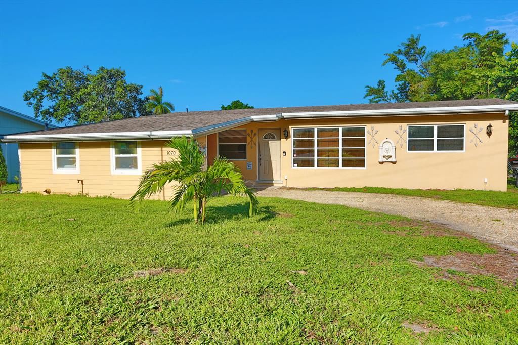 Photo of 1070 W Shore Drive, West Palm Beach, FL 33406 (MLS # R10745026)