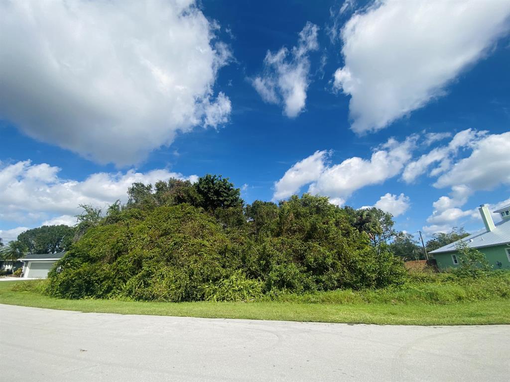 This is your opportunity to BUILD your dream home on this wonderful half acre LOT in the desirable Sandpiper Bay!