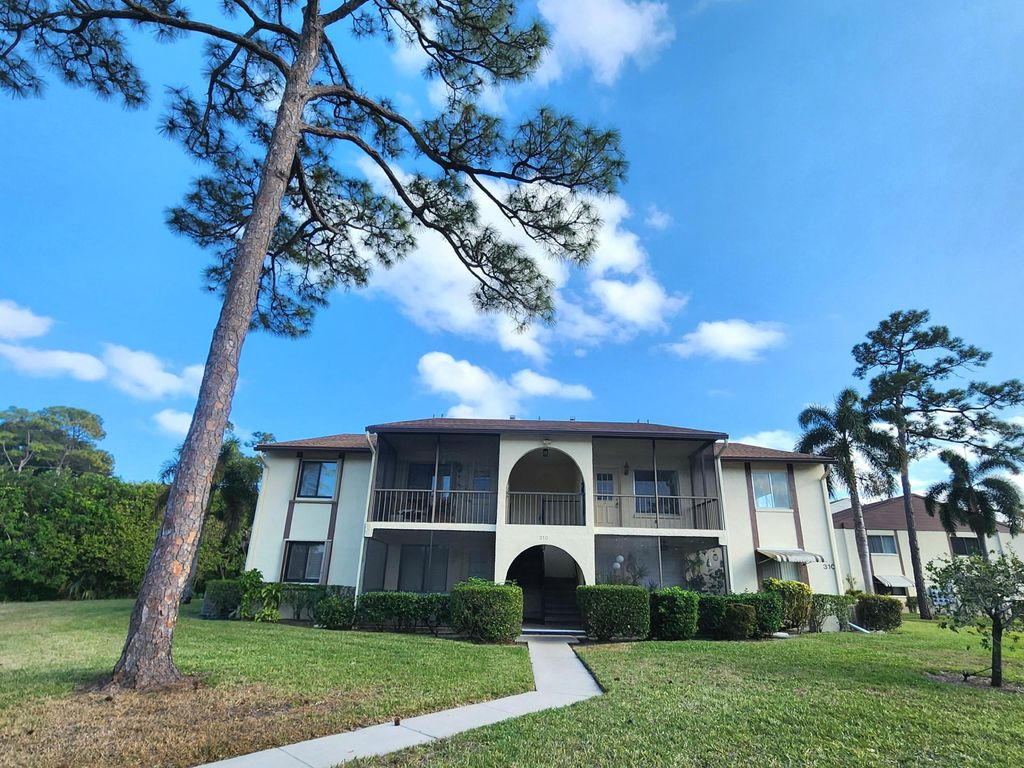 Photo of 310 Knotty Pine Circle #A-1, Greenacres, FL 33463 (MLS # R11168098)