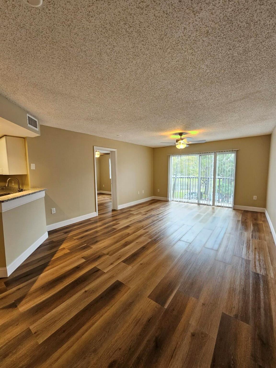 Special Leasing Deal: Pay the Last Month's rent deposit in 12 equal monthly installments starting from the first month, no upfront payment needed! Fully renovated 2 bed, 2 bath, 1-car garage unit in the desirable resort-style community of The Grand Isles. This beautiful 2nd-floor unit features full-size washer/dryer, walk-in closets, ceramic tile in foyer, kitchen, and bathrooms, brand new laminate in the living room and bedrooms, new granite countertops, upgraded lighting and ceiling fans, and new appliances. Enjoy resort-style amenities including a swimming pool with sundeck, jogging trail around the lake, picnic/grilling areas, playground, tennis and volleyball courts, and gated entry. Conveniently located minutes from downtown West Palm Beach, Palm Beach International Airport, .