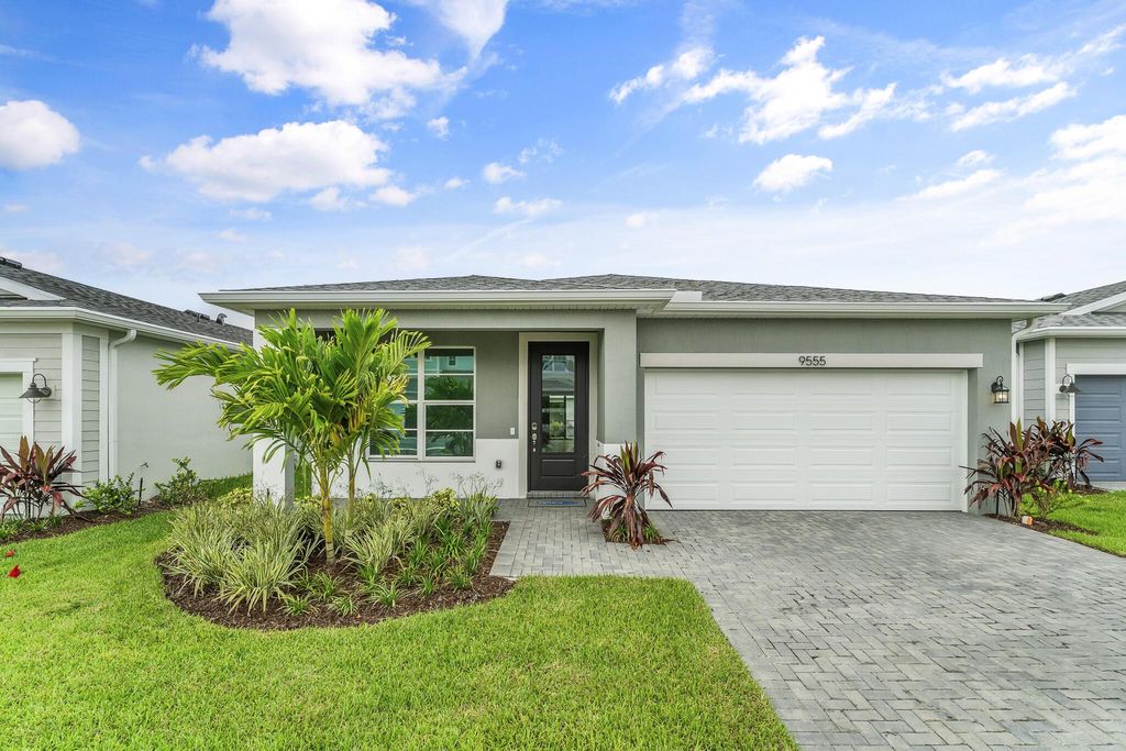 Photo of 9555 SW Indra Way, Port Saint Lucie, FL 34987 (MLS # R11103035)
