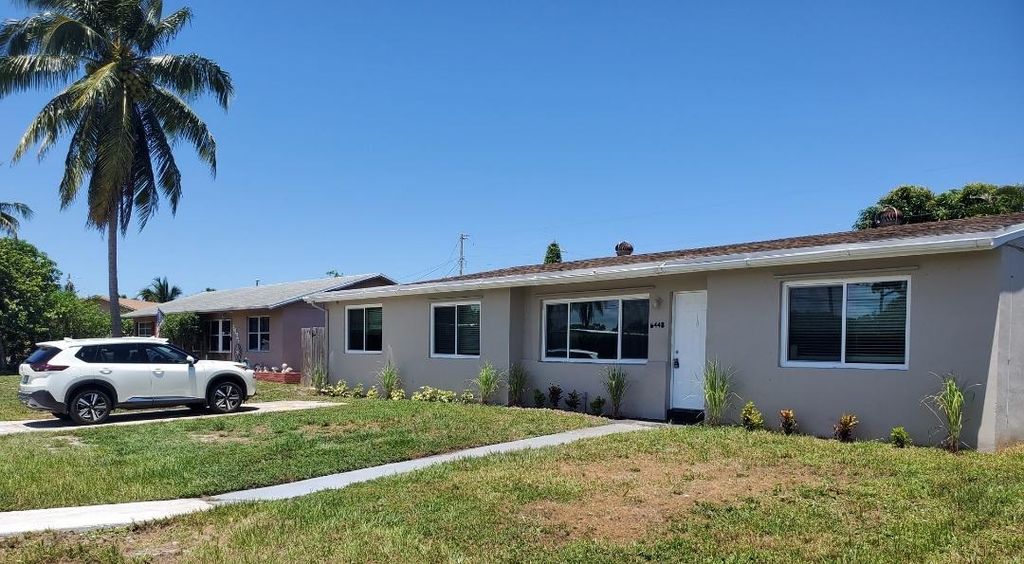 Photo of 6448 N Lawrence Road, Lake Worth, FL 33462 (MLS # R11109858)