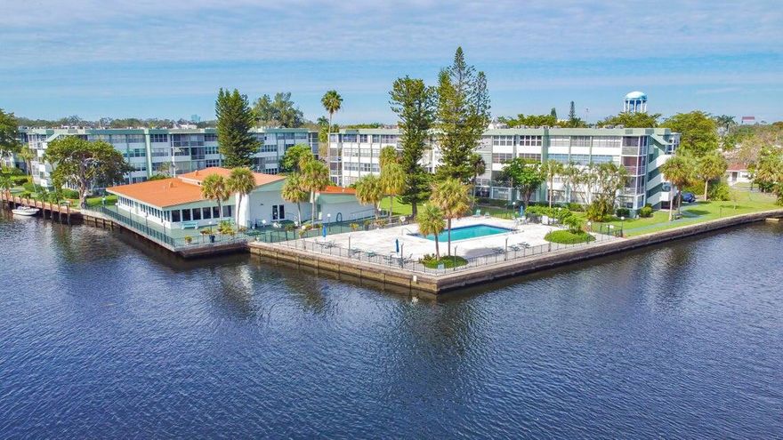 Updated 4th floor, bright & breezy corner unit. Welcome to the sunny side. New SS kitchen appliances, ice maker/H2o dispenser sparkly quartz countertops. Laminate & tiled flooring. Custom closets in Master suite. Modern paint throughout. Screened-in balcony with rolled shutters, overlooks lush landscape, partial marina/canal, iconic Hollywood water tower view. Shared laundry on each floor. Elevator Includes: Basic cable, internet, pest control, water, trash removal. 2 heated pools, tennis, clubhouse, BBQ, billiards. 3 miles to famous Hollywood Beach Broadwalk, minutes to TY Park & Tri Rail Sheridan station. Walk to Yellow Green Farmers Market. Dine, shop, playDania Pointe w entertainment. Oakwood Plaza close by. 3 mi FLL, 22 mi MIA. Sweet spot. $150.00 HOA application/Interview.Pets=Love