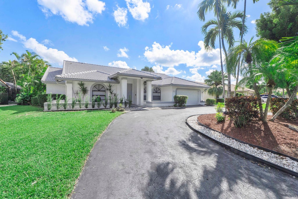 Photo of 11932 NW 2ND Street, Coral Springs, FL 33071 (MLS # B26089307)