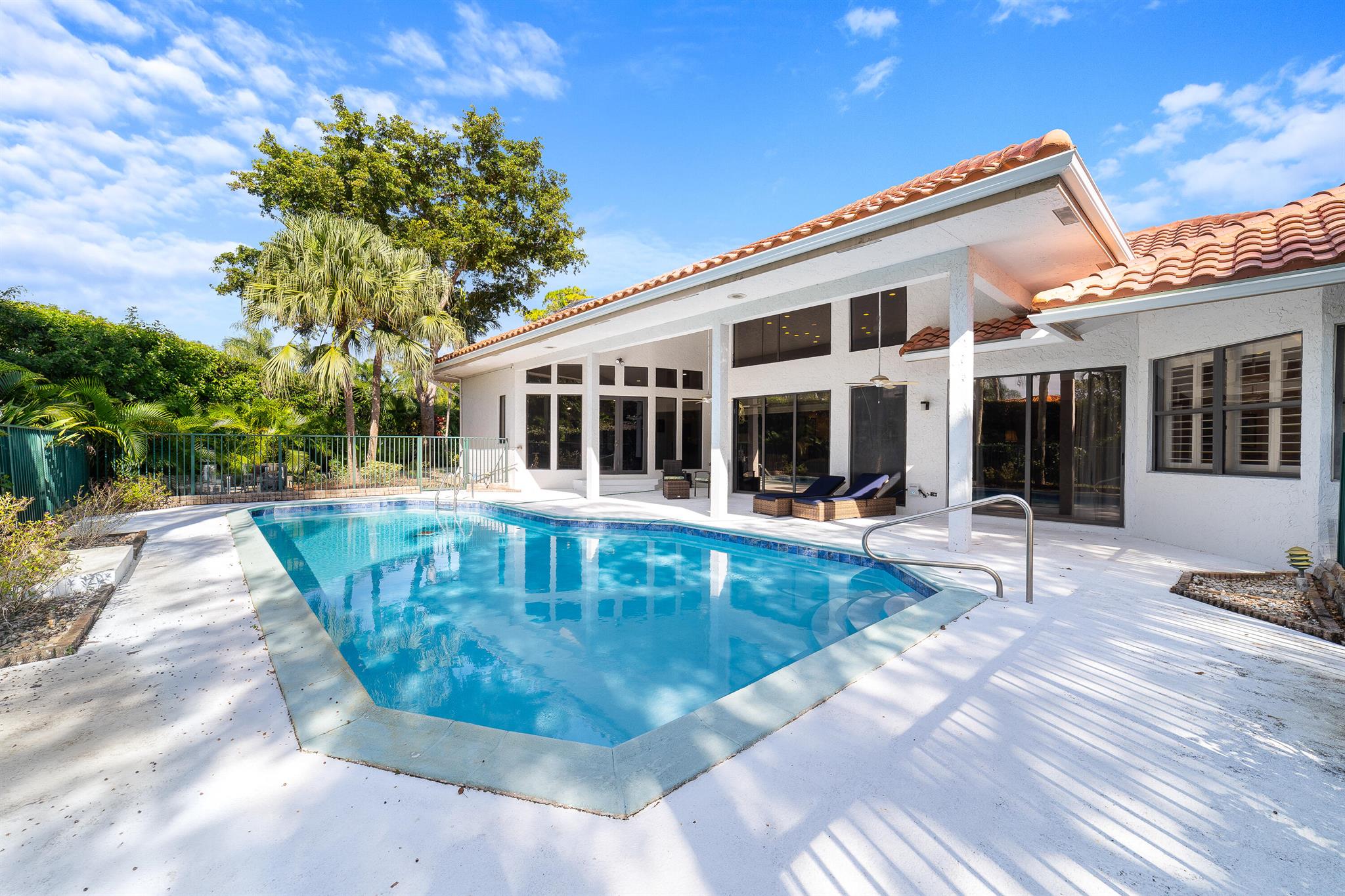 Introducing 42 Northwoods Lane - A Family Oasis with a 1500 sq ft Guest House 'Casita' and a brand NEW ROOF. Nestled within the esteemed community of Hunters Run, this property stands as a truly unique and fine residence. The main house boasts 3 spacious bedrooms, each accompanied by its own luxurious en suite bathroom, complemented by a well-appointed office/den and powder room. Experience the expansive living room, bathed in natural light, offering panoramic views of the pool and backyard. Recent renovations have endowed the large chef's eat-in kitchen with porcelain counters, top-of-the-line stainless steel appliances and double oven creating a culinary haven that overlooks the pool. The primary suite is a retreat unto itself featuring a generously sized bedroom.