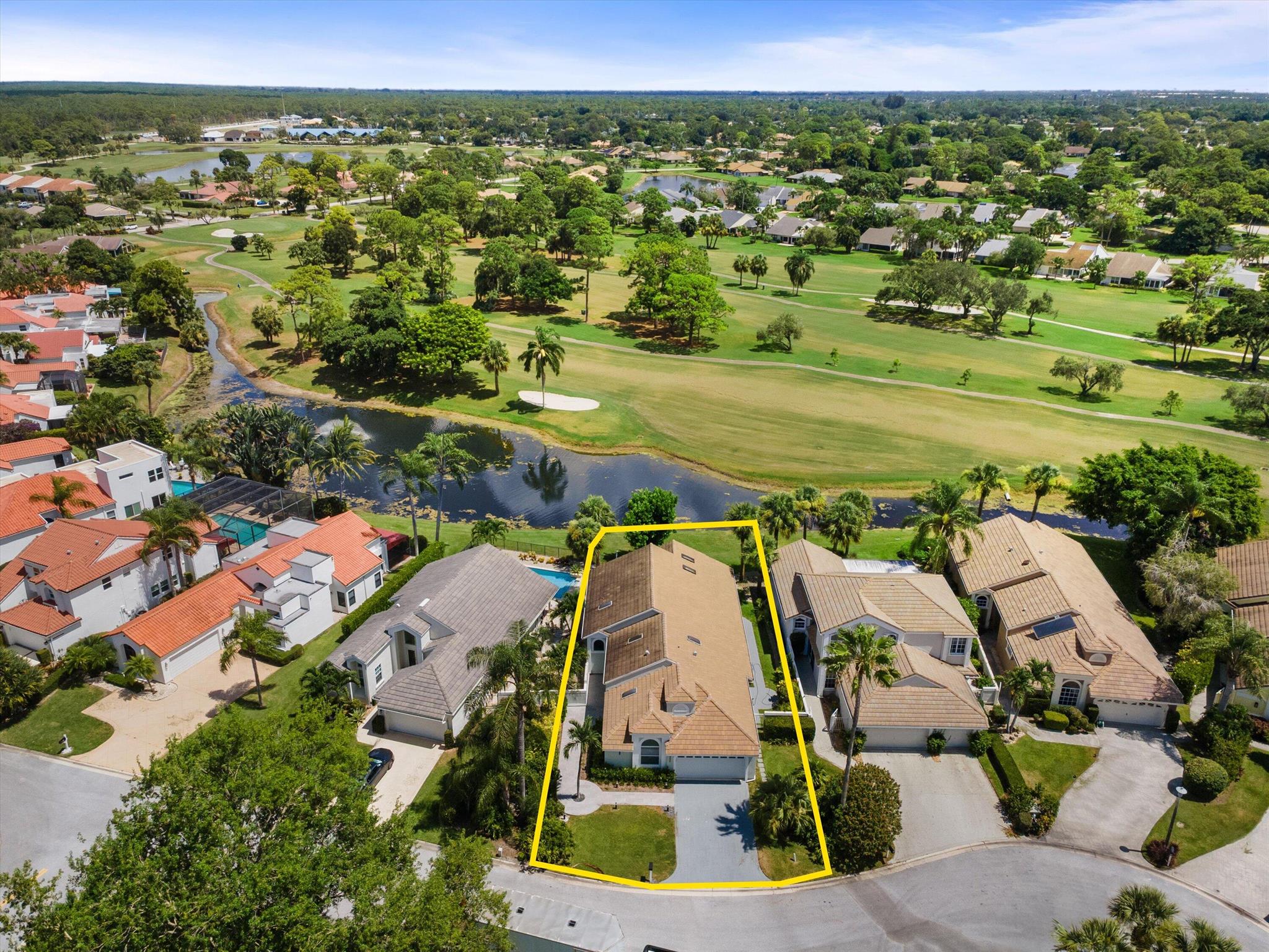 Available furnished seasonally or annually (also available unfurnished). This beautifully renovated 4-bedroom, 4-bathroom single-family home is a rare opportunity in the prestigious gated Eastpointe Country Club. Boasting panoramic lake views and sights of the Fazio-designed golf courses, the home offers refined comfort with organic elegance.Step into a grand open floor plan with soaring vaulted ceilings and a gourmet chef's kitchen featuring a large center island, high-end European cabinetry, and premium appliances. The home has been fully remodeled with Italian porcelain tile flooring throughout, designer bathrooms, custom lighting, and impact-rated windows