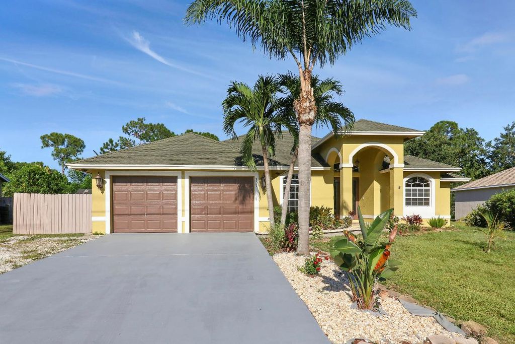 Photo of 709 NW North Macedo Boulevard, Port Saint Lucie, FL 34983 (MLS # R11154520)