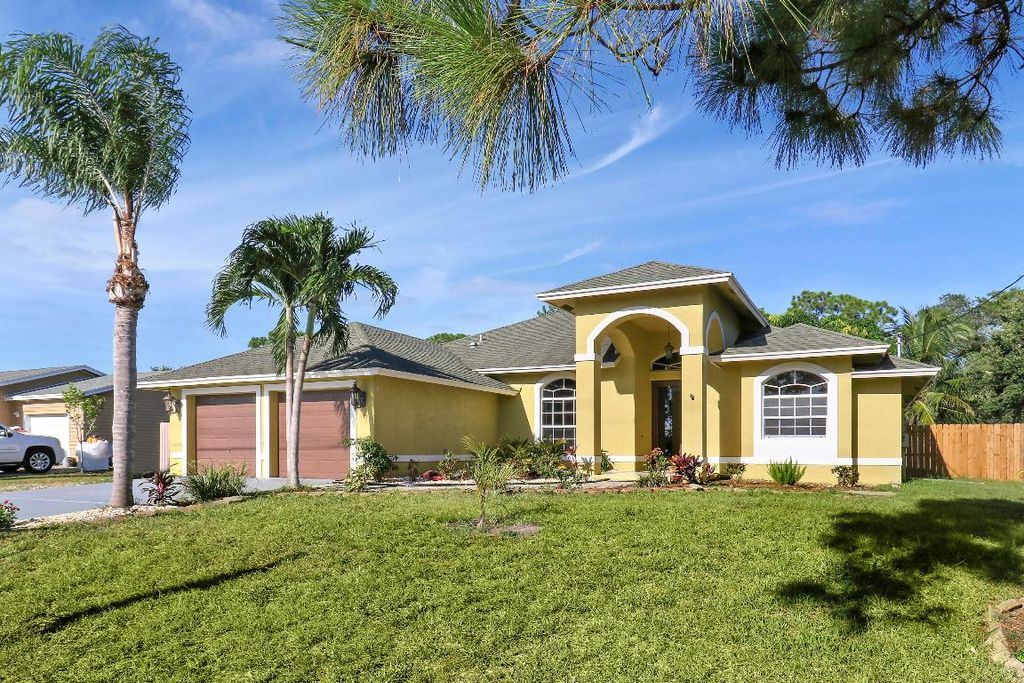 Photo of 709 NW North Macedo Boulevard, Port Saint Lucie, FL 34983 (MLS # R11154520)
