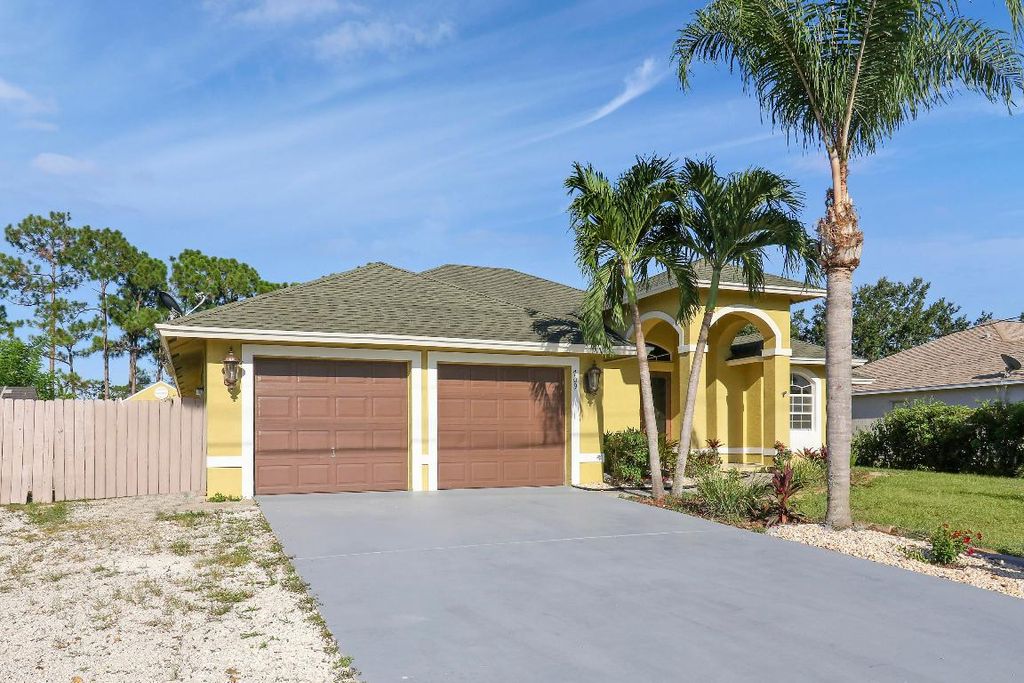 Photo of 709 NW North Macedo Boulevard, Port Saint Lucie, FL 34983 (MLS # R11154520)