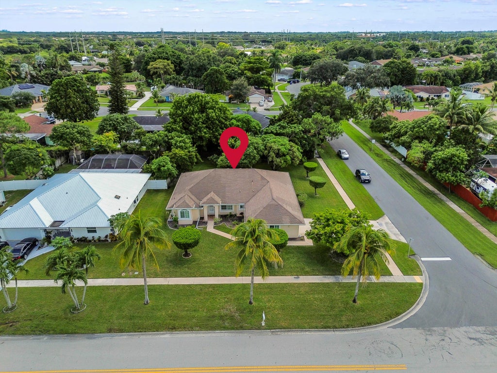 Photo of 203 Ponce de Leon Street, Royal Palm Beach, FL 33411 (MLS # B26085814)