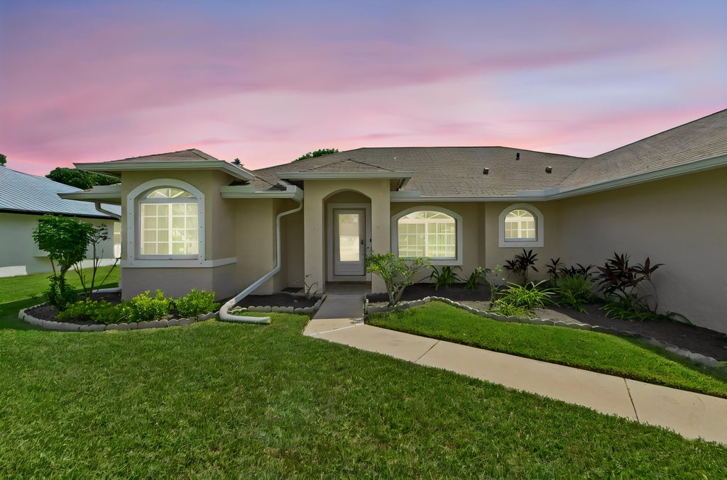Photo of 203 Ponce de Leon Street, Royal Palm Beach, FL 33411 (MLS # B26085814)