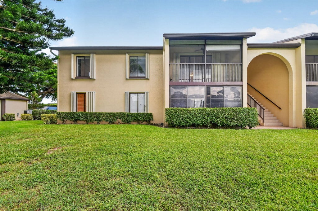 Photo of 623 Sea Pine Way #E2, Greenacres, FL 33415 (MLS # B26070349)