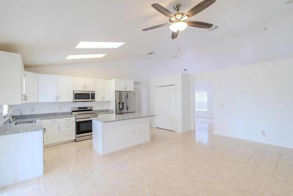 Photo of 3631 SW Kasin Street, Port Saint Lucie, FL 34953 (MLS # R11096545)