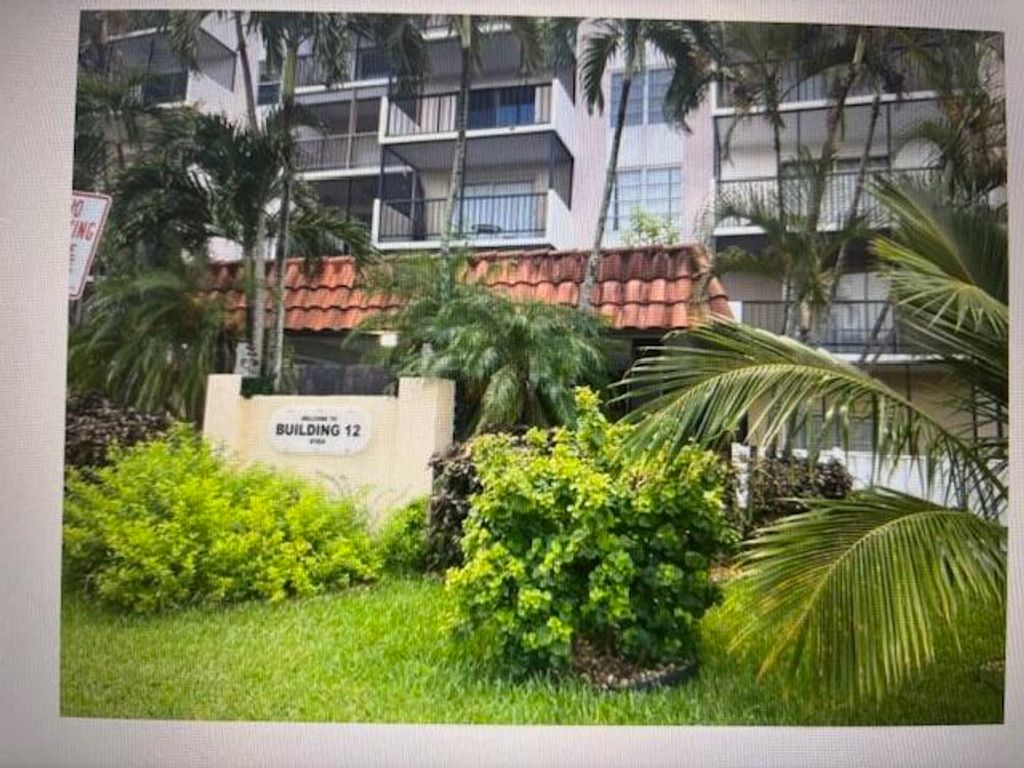 Photo of 4164 Inverrary Drive #702, Lauderhill, FL 33319 (MLS # R11168115)