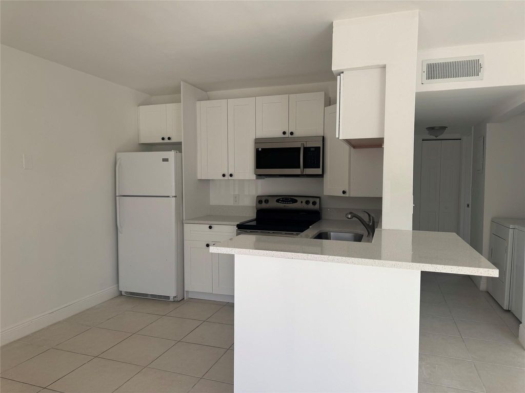 Photo of 11457 NW 42nd Street #11457, Coral Springs, FL 33065 (MLS # F10544280)