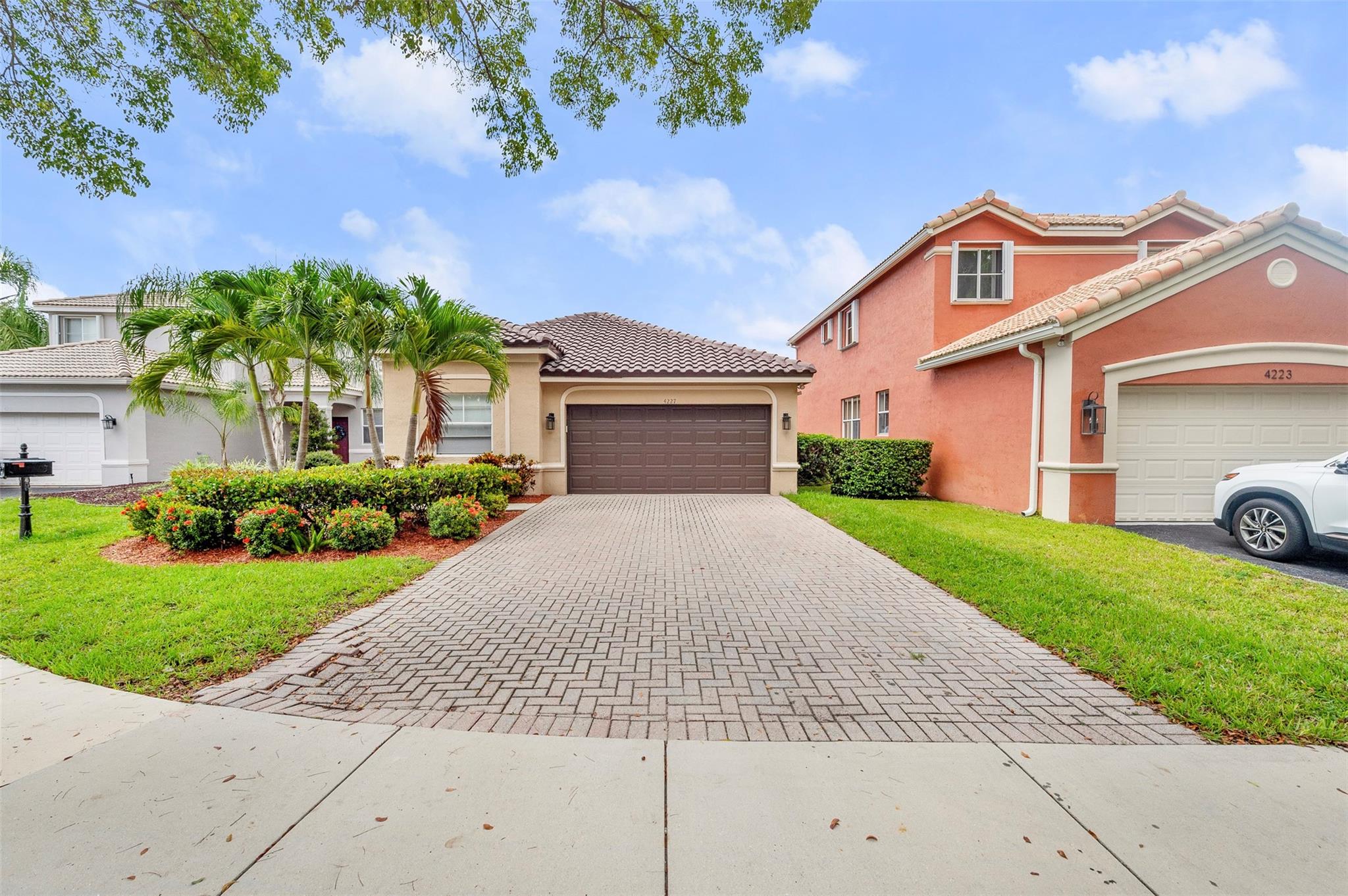 Beautiful and spacious 4-bedroom, 2.5-bathroom one-story home with a 2-car garage, ready for immediate move-in! This well-maintained property features a brand-new roof, brand-new AC, fresh interior paint, and new sod in the backyard. Located in a secure community with two guard-gated entrances, residents enjoy access to a clubhouse, large pool, kids' pool, basketball court, and a tot lot. Zoned for top-rated schools: Everglades Elementary, Falcon Cove Middle, and Cypress Bay High. Small dogs welcome (under 35 lbs); no cats or large dogs permitted. Tenant is responsible for electric and water lawn and shrubbery maintenance included. No HOA approval required!