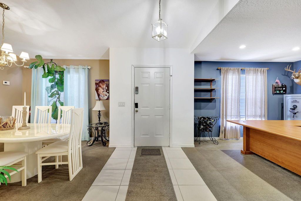 Photo of 2063 NE Christopher Court NE, Jensen Beach, FL 34957 (MLS # R10998907)