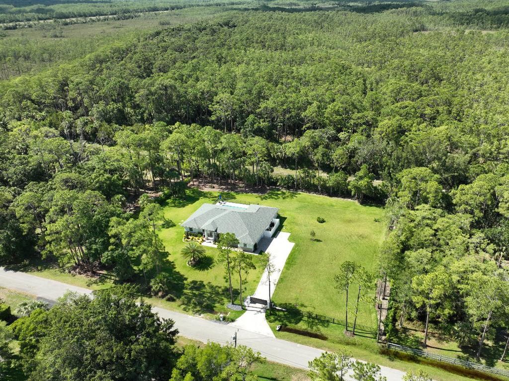 Photo of 9430 150th Court N, Jupiter, FL 33478 (MLS # R10997251)