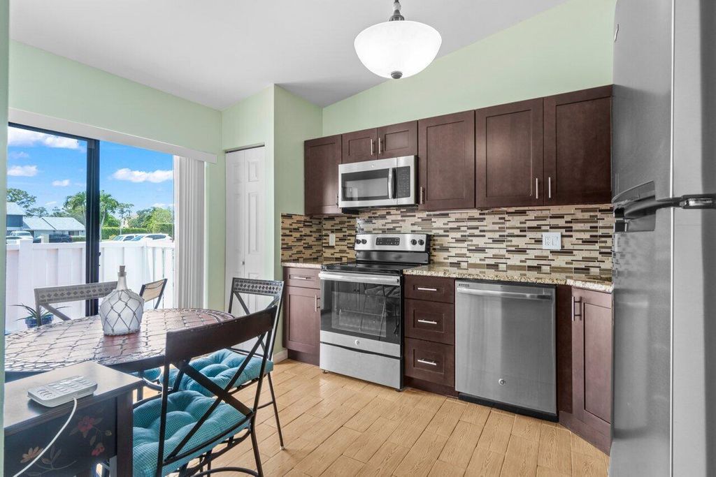Photo of 2641 Gately Drive W #103, West Palm Beach, FL 33415 (MLS # R11087304)