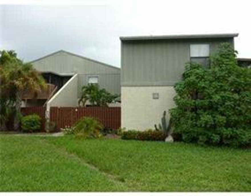 WOW Desirable 1st floor location with a fenced in courtyard- close to i-95-