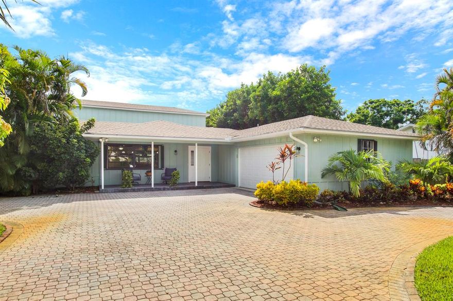 Rarely available updated turn key 5 bedroom 3 bath home in Tequesta! This recently renovated home has a open concept with a breathtaking kitchen that is the center piece of the main living area. Great for growing family or multi generational family. The first floor master suite is complete with a luxurious master bath which includes a seamless shower, large spa tub, and large walk in closet. There are two more first floor bedrooms and a bonus room and the second floor has two bedrooms with a amazingly updated 2nd floor bathroom. Other upgrades include new Tile flooring, Crown Molding throughout, pocket sliders, large screened patio and 2nd floor sun deck. This immaculate home is just minutes to fine dining, shopping, and beaches. Room for a pool and great schools for the kids. Preview Now!