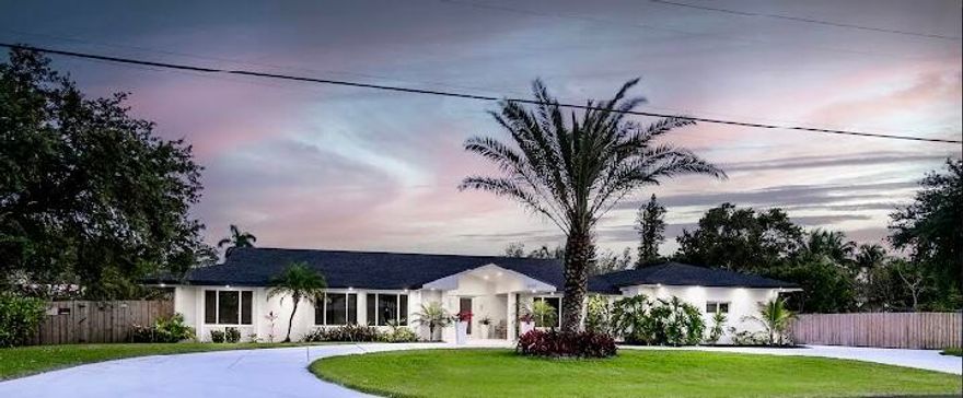 An OASIS in the city! COMPLETLY remodeled in 2020 with additional square footages add to it. 4/3 Old Pompano Home build on OVERSIZED rarely available, 22,913 sf lot {over 1/2 ACRE} with ample room to build a guesthouse! Spectacular circular driveway to park over 25 VEHICULES, store your dream BOATS & RVs. 2 1/2 CAR GARAGE with custom cabinetry. Gorgeous Yard, Large COVERED PATIO 20 x 20, travertine, HUGE Pool 36x16x10 feet depth, outdoor shower, cabana bath, completely fenced. OPEN concept home, custom designer kitchen cabinetry, OVERSIZE island, quartz countertops, FIREPLACE, impact windows. Only 4 min. from Pompano Airport, close to Parks, Pompano High School # 1 Rated, 1.2 miles to the Peer & Beach Area: Restaurants-Bars-Hotel. Pompano is booming! This is where you want to be. MUST SEE!