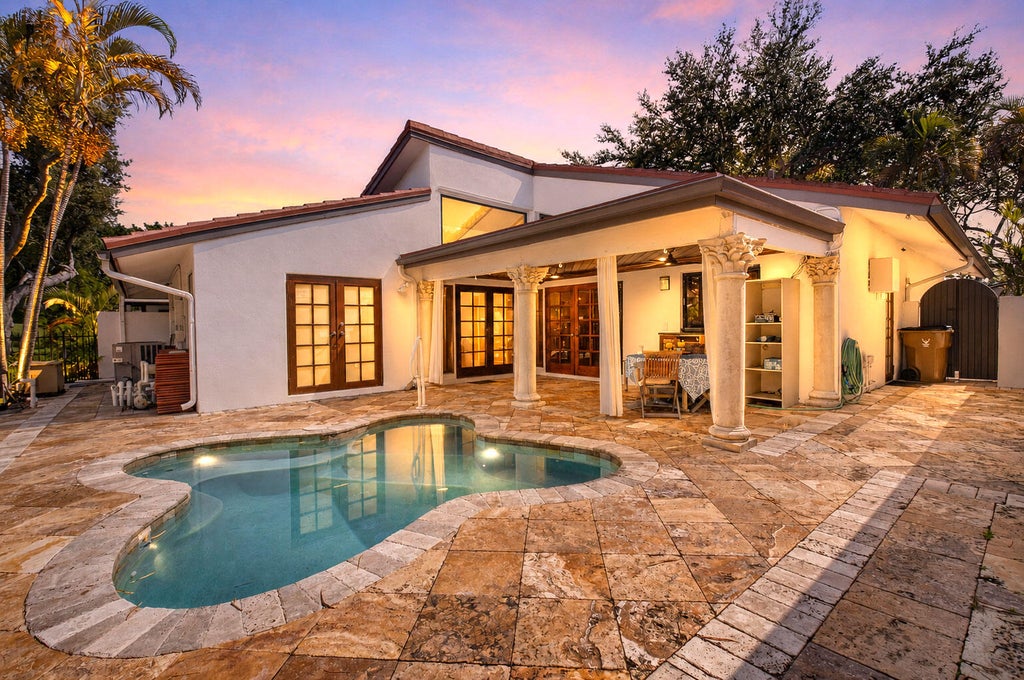 Photo of 663 DEER CREEK HOLLOWS Circle, Deerfield Beach, FL 33442 (MLS # B26066320)