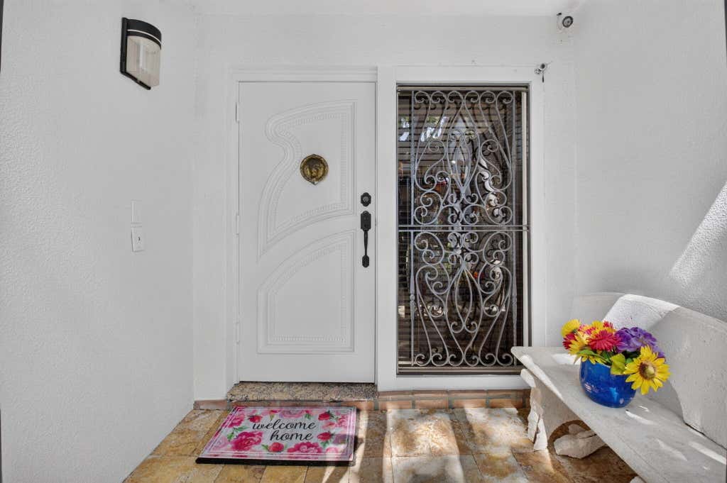 Photo of 663 DEER CREEK HOLLOWS Circle, Deerfield Beach, FL 33442 (MLS # B26066320)