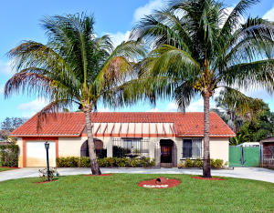 Don't miss out on this great opportunity to own this Spanish influenced single family home. The home features 3 bedrooms, 2 bathrooms, a den and 1 car garage. with too many options to list, a few include, a custom front door that leads into a foyer which overlooks the living room, dining room and family room; the master suite offers his and hers closets, updated bathroom and plenty of room for your furniture; an open, spacious kitchen overlooking the pool offering the space you need for cooking and entertaining; the den/bonus room has a glass sliding door that leads out to a large patio and screened-in pool area; the enormous family room offers a custom built-in bar that is also perfect for entertaining all your guests; the exterior of the property has a large heated screened-in pool....