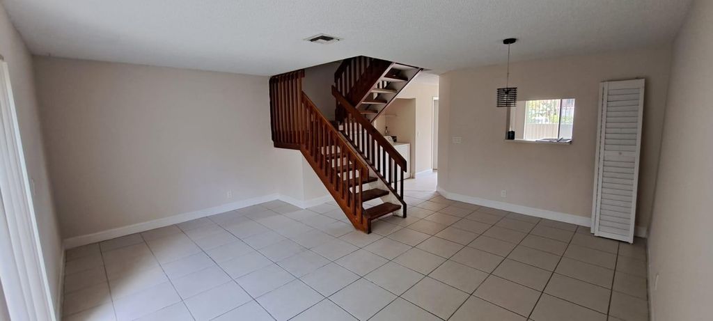 Photo of 11417 Royal Palm Boulevard, Coral Springs, FL 33065 (MLS # F10511654)