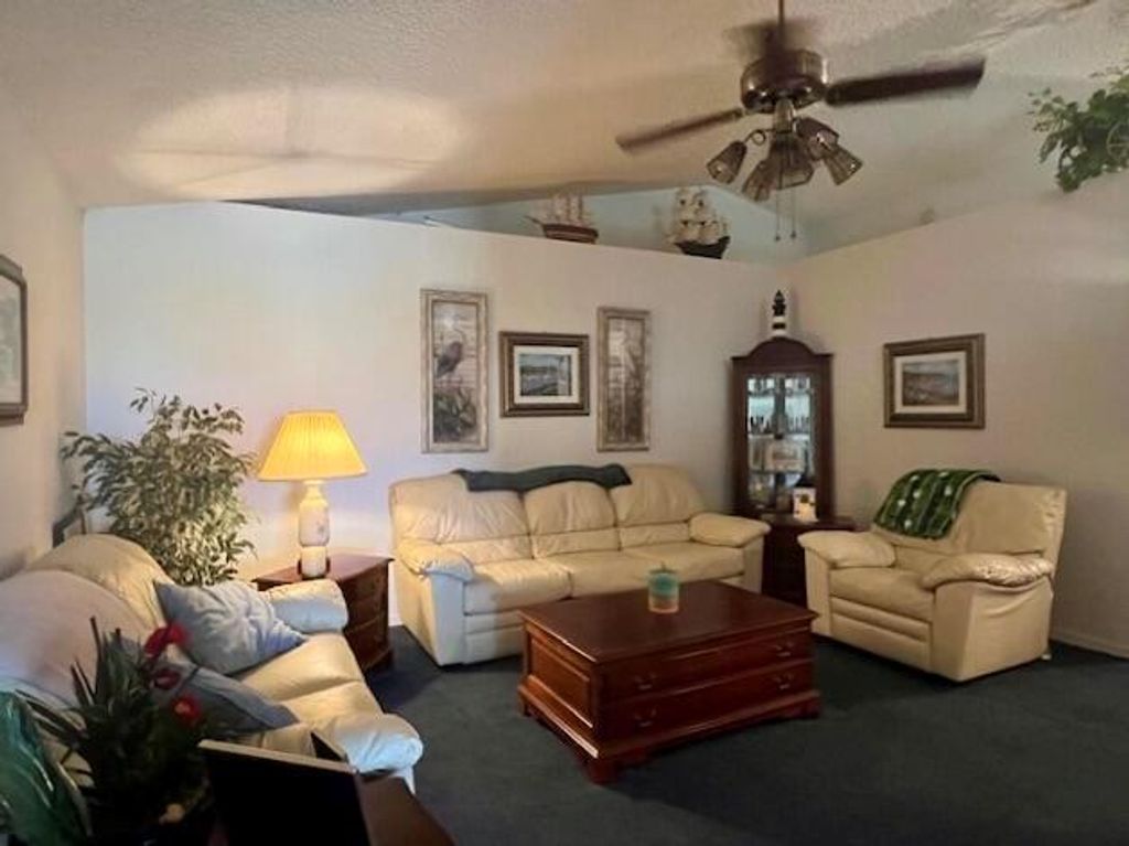 Photo of 333 NE 7th Street, Belle Glade, FL 33430 (MLS # R10999193)