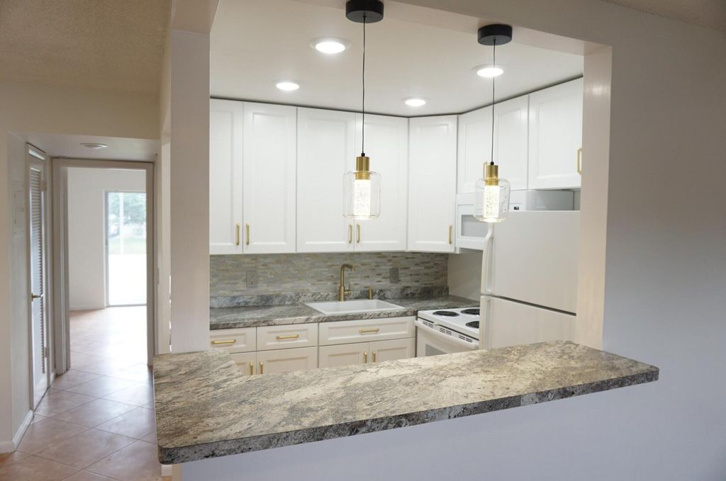 Photo of 137 Canterbury F, West Palm Beach, FL 33417 (MLS # R11117162)