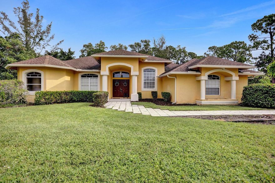 BEAUTIFUL  3 BEDROOM HOME, WITH A DEN THAT CAN BE USED AS A 4TH BEDROOM.-
3 FULL BATHROOMS-
ENJOY THE SCREENED IN PATIO OVERLOOKING A  LARGE YARD & PLENTY OF ROOM FOR A POOL-THE HOUSE SITS ON 1.15 ACRE LOT-PAVED DRIVEWAY -2 CAR GARAGE-SHED- REVERSE OSMOSIS SYSTEM FOR THE WHOLE HOUSE-CLOSE TO SCHOOLS & MAJOR HIGHWAYS