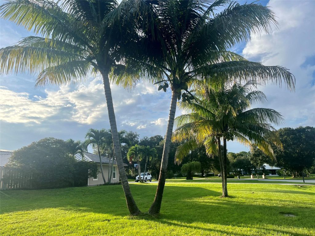 Photo of 2551 SW Racquet Club Drive, Palm City, FL 34990 (MLS # F10411984)