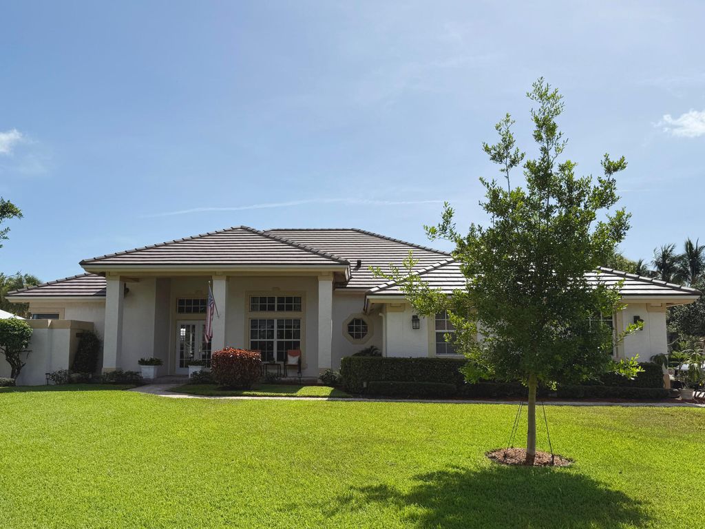 Photo of 7983 SE Osprey Street, Hobe Sound, FL 33455 (MLS # R11056259)