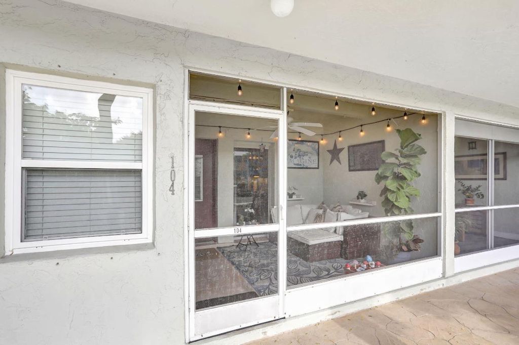 Photo of 860 SE 6th Avenue #104, Deerfield Beach, FL 33441 (MLS # R11152485)