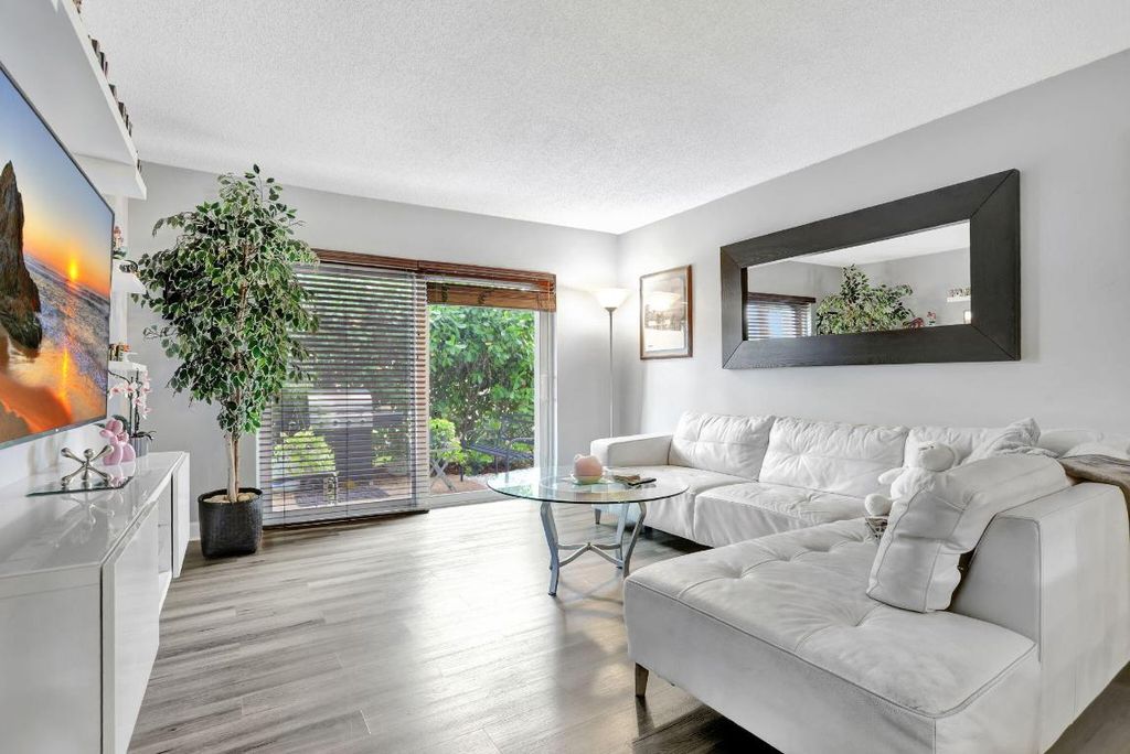 Photo of 860 SE 6th Avenue #104, Deerfield Beach, FL 33441 (MLS # R11152485)