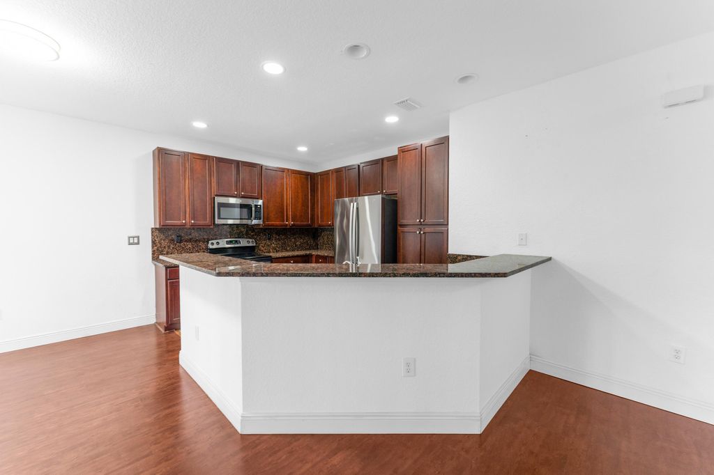 Photo of 6077 W Grand Cypress Cir Circle W, Coconut Creek, FL 33073 (MLS # B26022434)