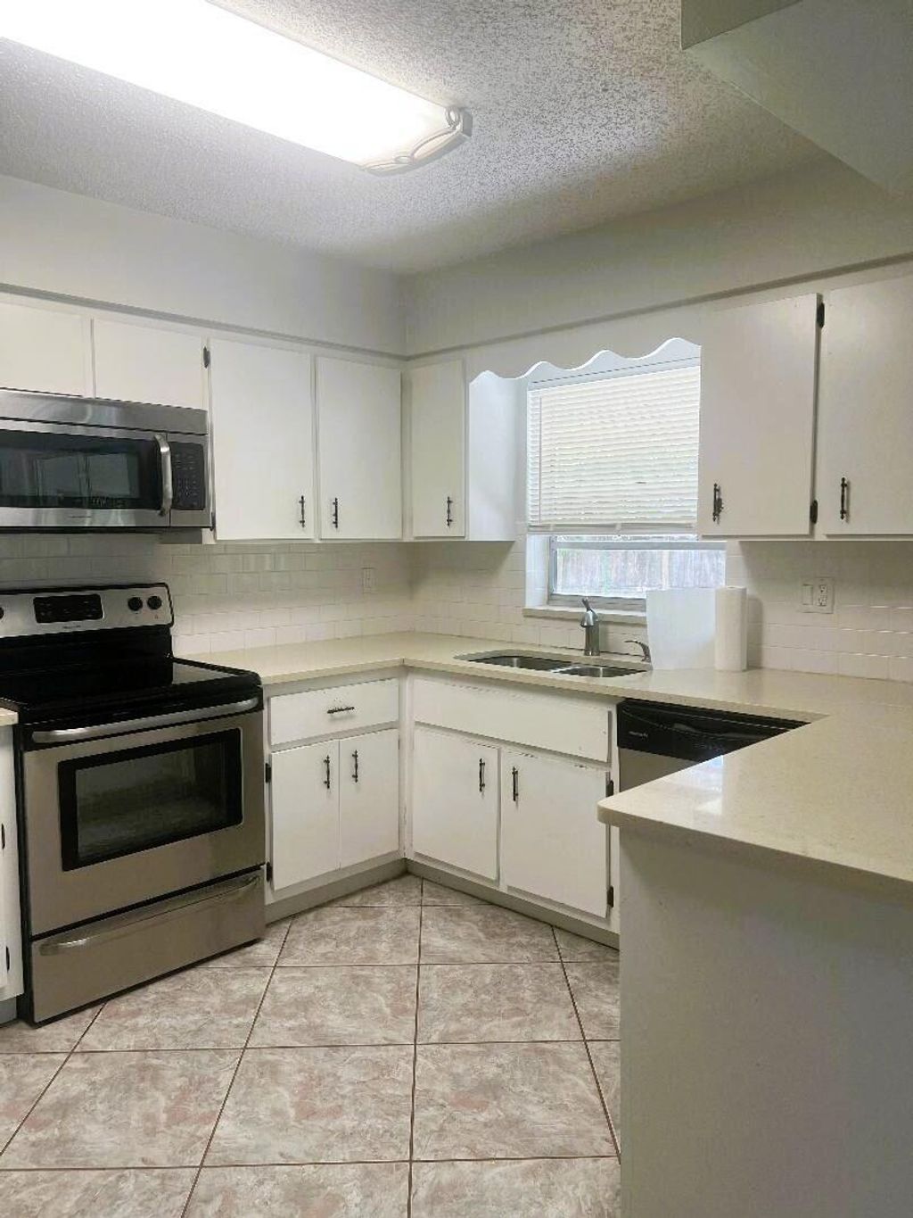 Photo of 7608 Kenwood Road, Fort Pierce, FL 34951 (MLS # R11083636)