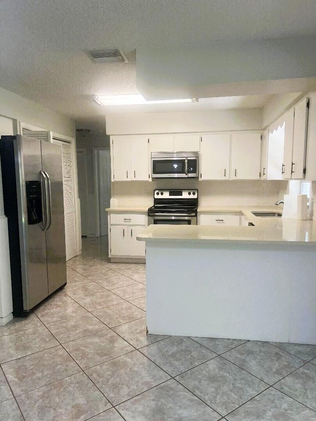 Photo of 7608 Kenwood Road, Fort Pierce, FL 34951 (MLS # R11083636)